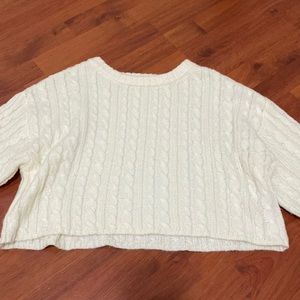 Slightly cropped cable knit sweater